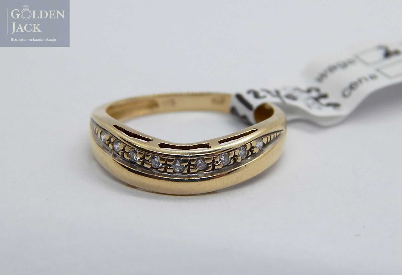 Złoty pierścionek z paskiem cyrkonii złoto pr. 585 roz. 16 waga 2,32 g