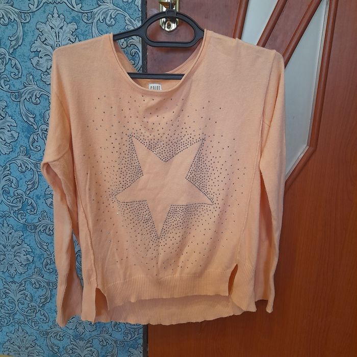 Жіноча кофтинка.