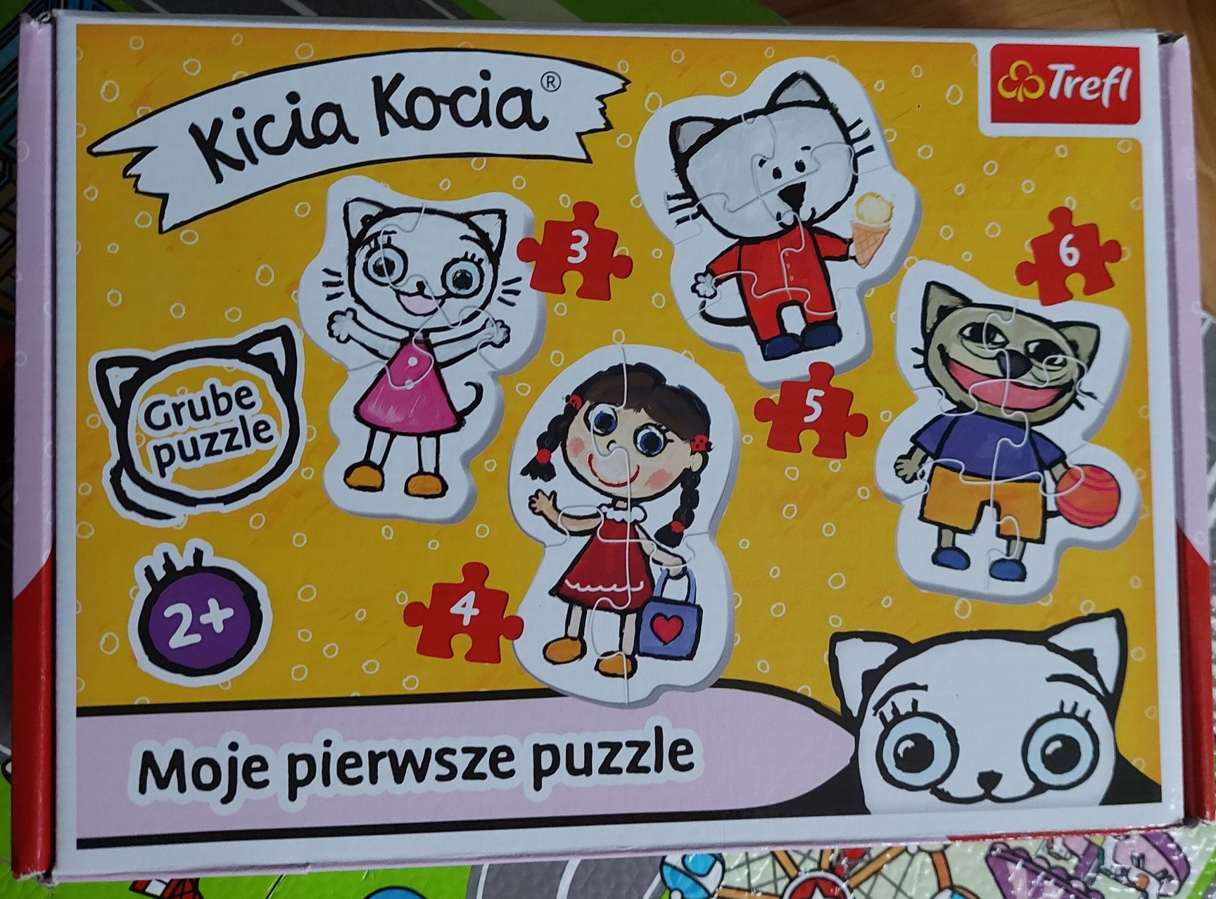 Kicia kocia na rowerze, na pikniku, w pociągu, itp.  Puzzle