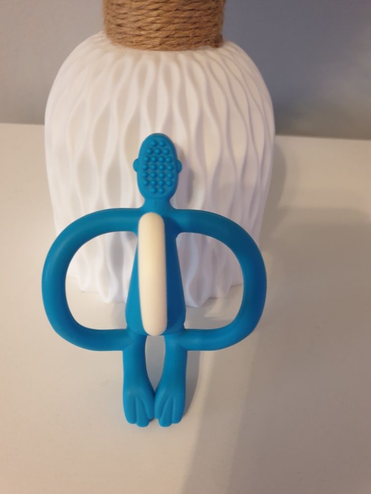 Idealny Matchstick Monkey Gryzak masujący ze szczoteczką NIebieski