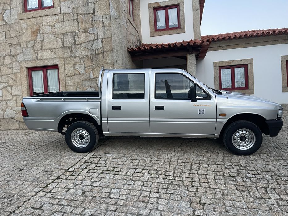 Pick-up 5 lugares, 4x2, caixa aberta