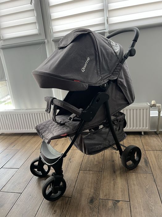 Продам сіру прогулянкову коляску Carello Quattro.