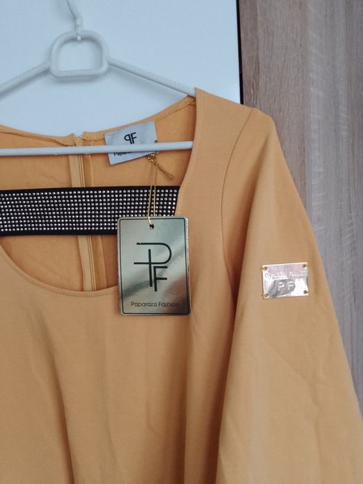 Nowa z metką sukienka