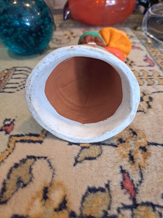 Boneca de barro antiga