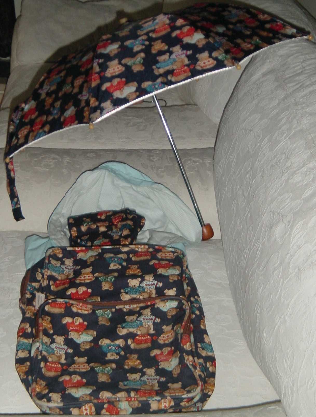 Conj. de acessórios Mochila, Chapéu Chuva desdobrável, Cachecol e mala