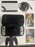 Nintendo Switch OLED + karta + dwie gry