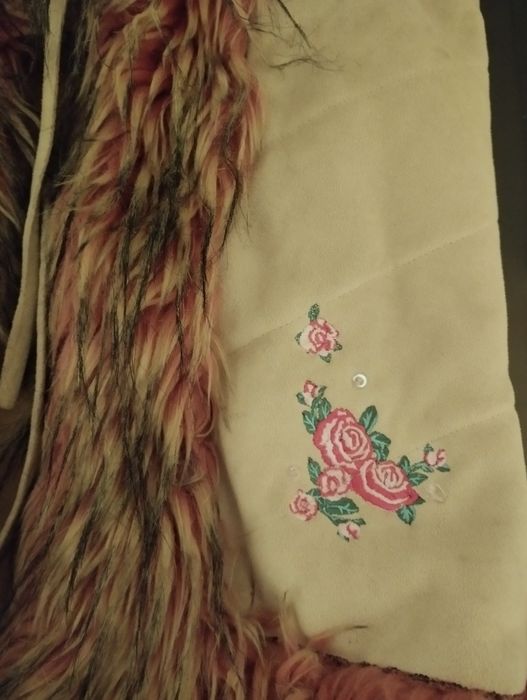 Bezrękawnik dziewczęcy rozmiar 140