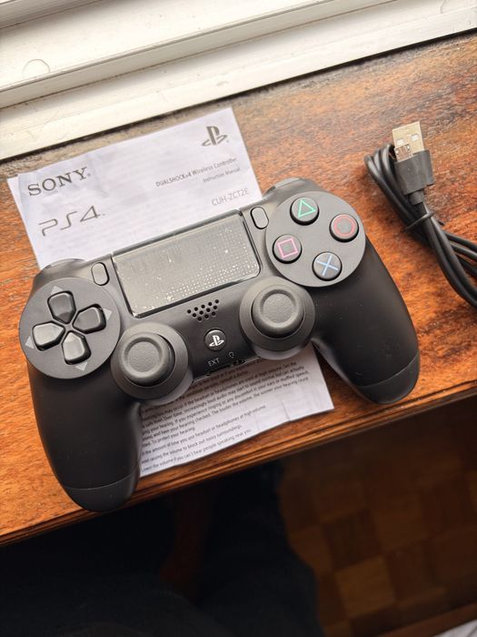 Comando ps4 sony original NOVO + cabo de carregar