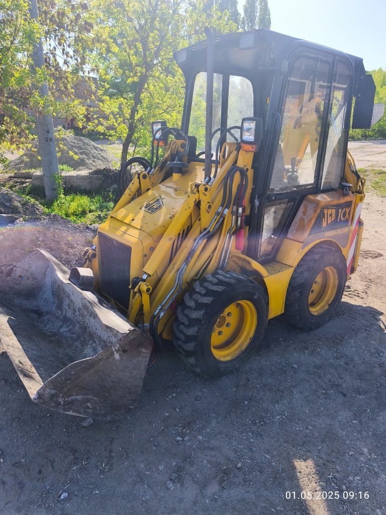 Минимогрузчик экскаватор JCB 1 cx