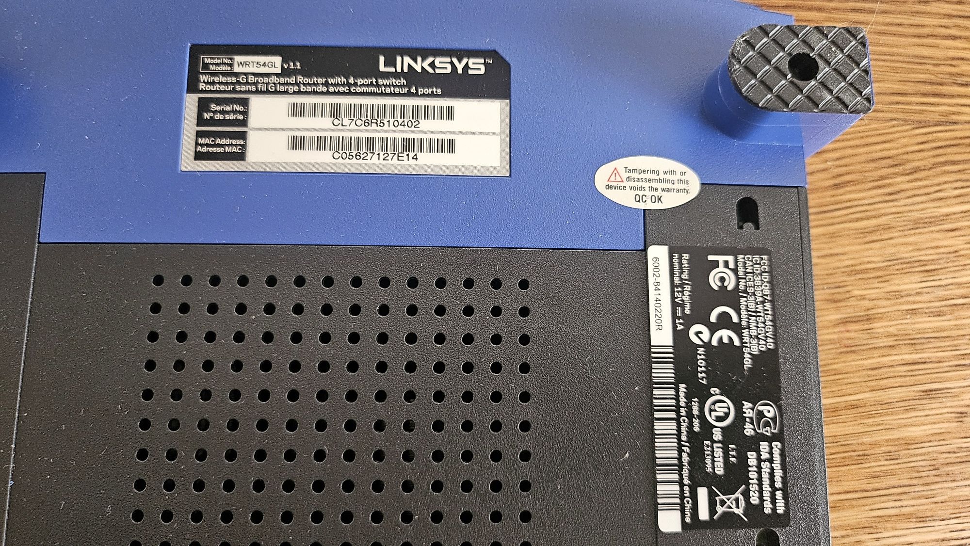 Router Linksys WRT54GL i D-Link DIR-825
