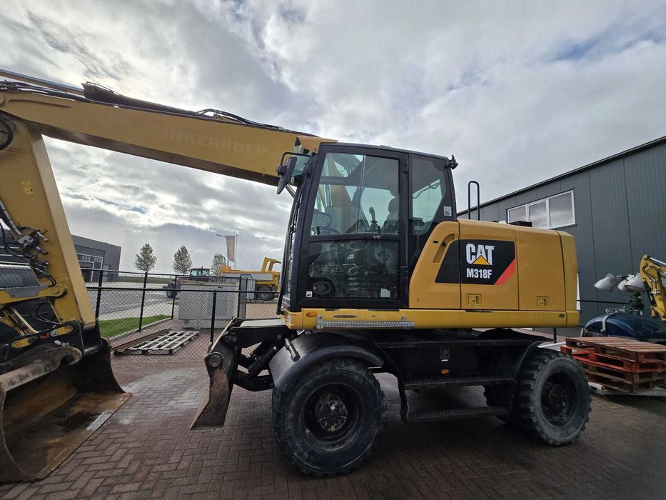 Koparka kołowa caterpillar 318 F