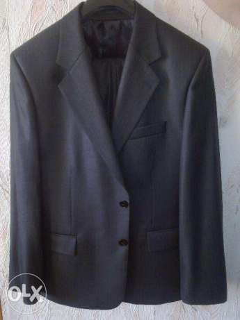 Продам мужской костюм,темно-серый,новый,размер 48-50,состав вискоза