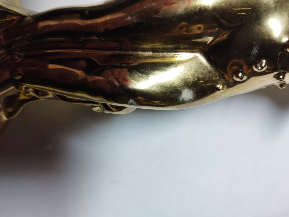 Подсвечник покрыт позолота.