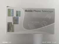 Mini teleskop z klipsem na telefon.