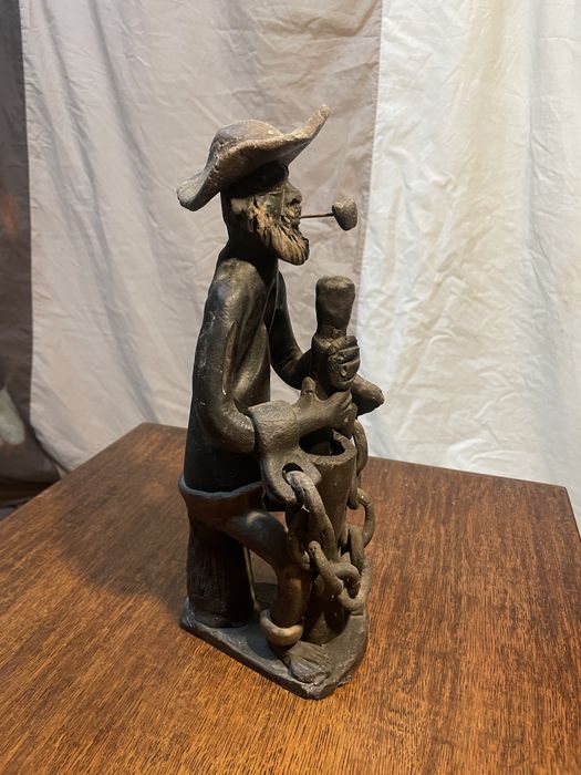 Escultura em barro cozido