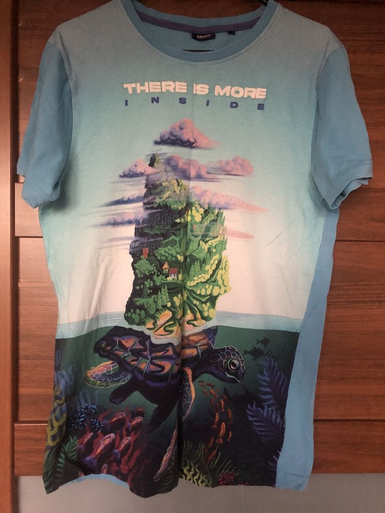 T- shirt błękitny z nadrukiem Cropp rozm S