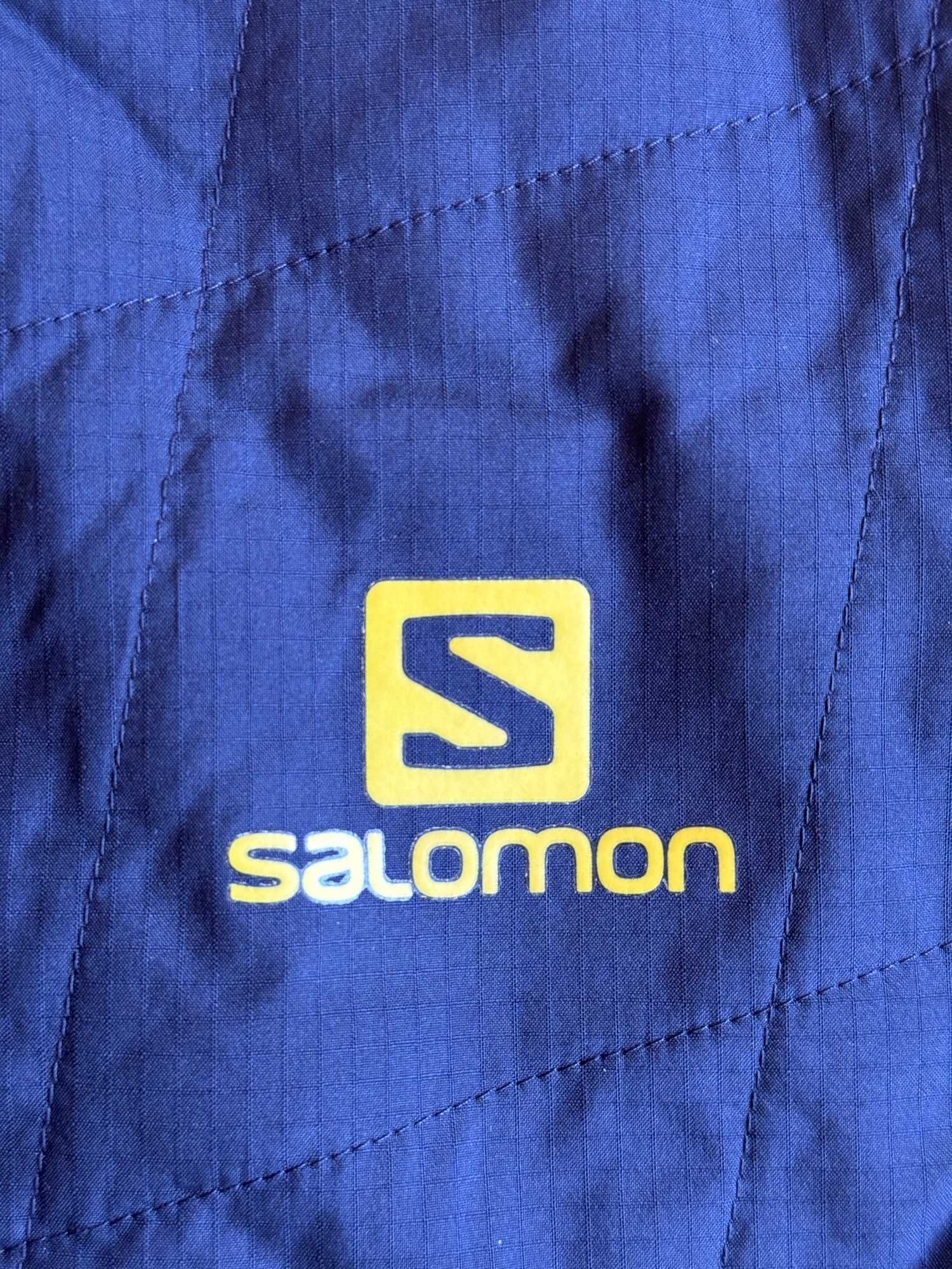 Colete reversível da marca Salomon