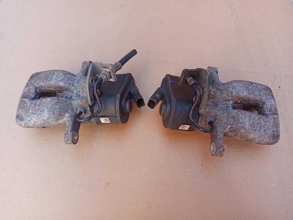 Zacisk hamulcowy Lewy tył elektryczny VW PASSAT B6