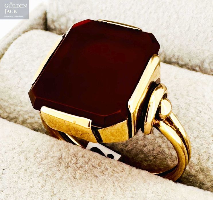 Złoty pierścionek z miodowym kamieniem złoto pr. 585 roz. 18 5,52 g