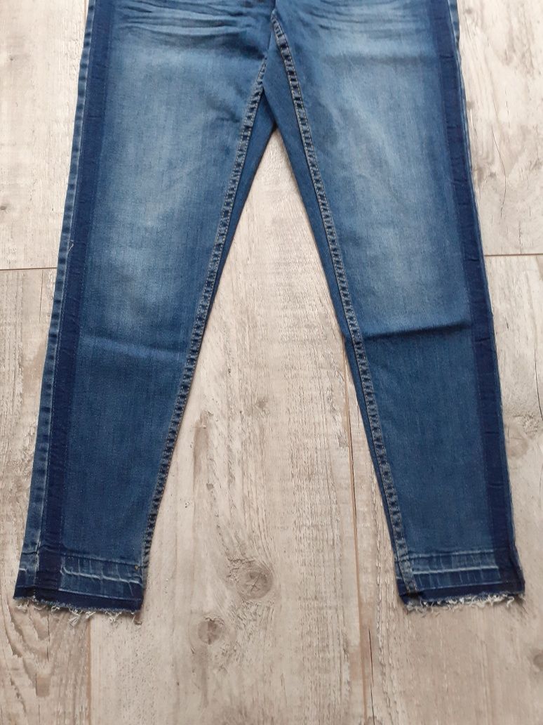 NOWE spodnie jeansy z lampasami Rozm. 38