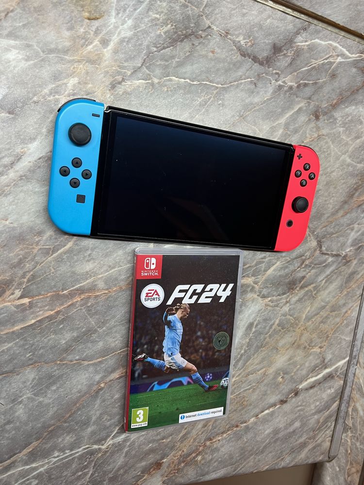 Продам Nintendo Switch Oled + катридж Fifa 2024