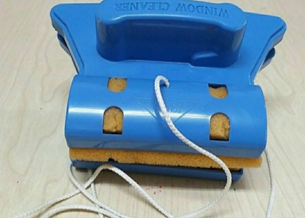 Limpa vidros magnético.