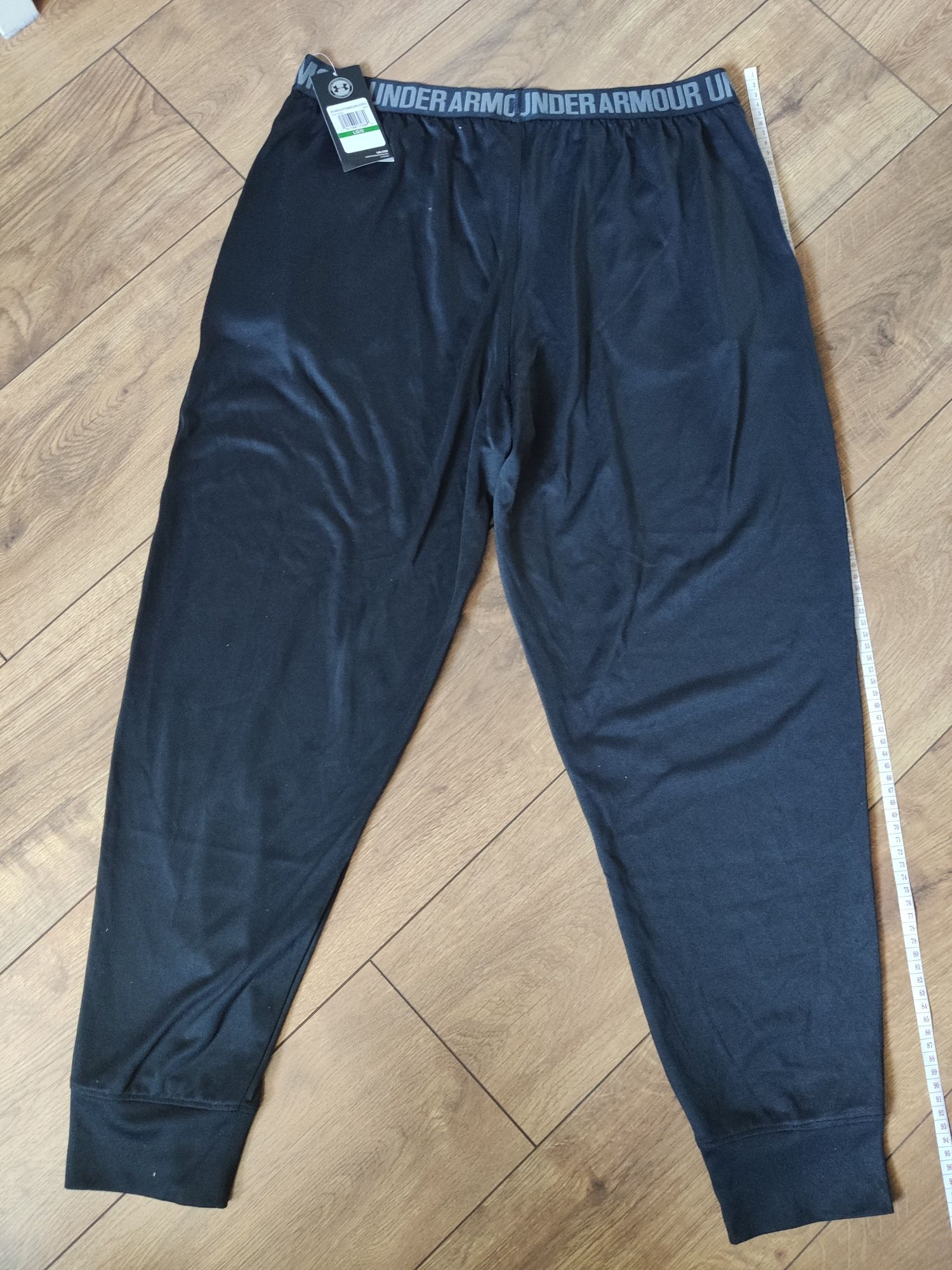 Damskie spodnie getry Under Armour rozm. XL (48-50)