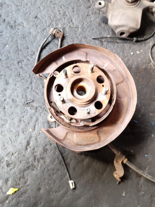 Поворотный кулак, цапфа, ступиця, супорт, диск, Туксон, КІА, KIA