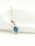 Naszyjnik z białego złota 14K z London Blue Topaz i diamentami 0.18ct