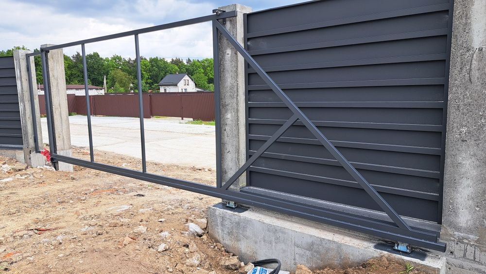 Відїздні ворота Двигуни.Наповнення воріт.ЖалюзіРанчоШтахети.Профнастил