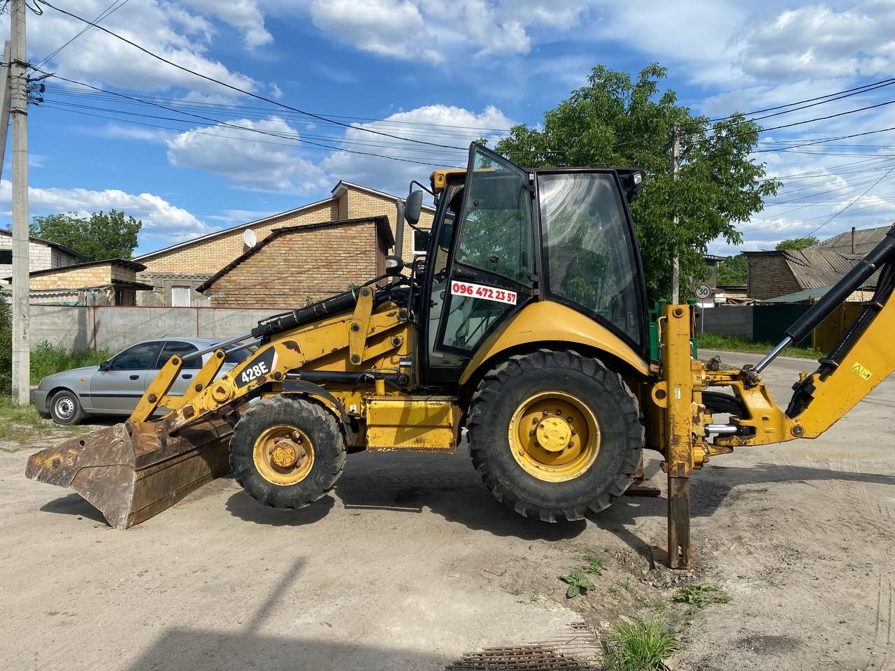 Ескаватор навантажувач Caterpillar 428E