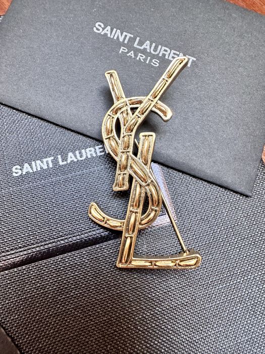 Broszka YSL stare złoto 5,3 cm