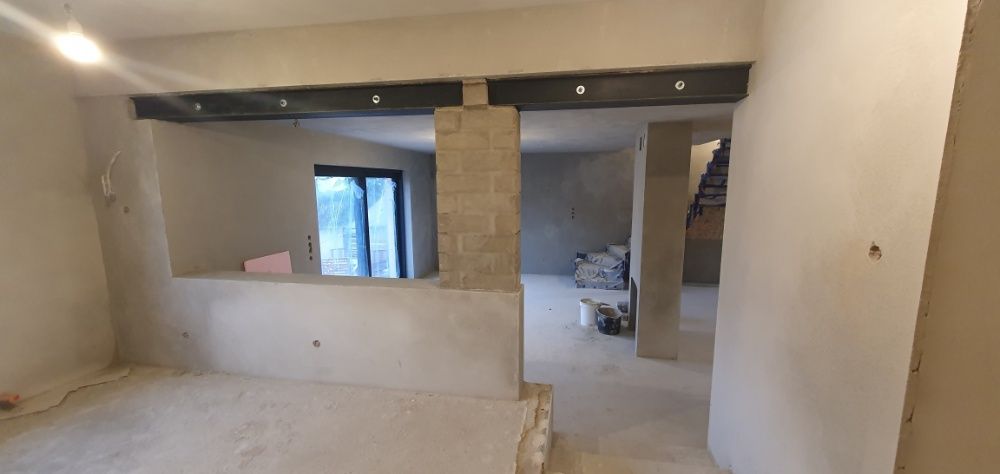 Tynki maszynowe gipsowe i cementowe - firma KONKRET