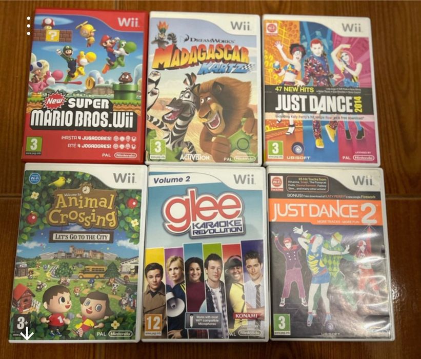 Consola WII com comandos, volante e jogos