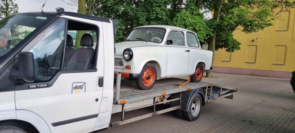 Pomoc drogowa. Usługi. Autolaweta. Transport aut