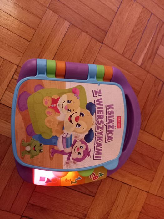 Grająca książeczka i laptop