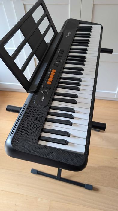 Casio Casiotone CT-S100 com stand e transformador