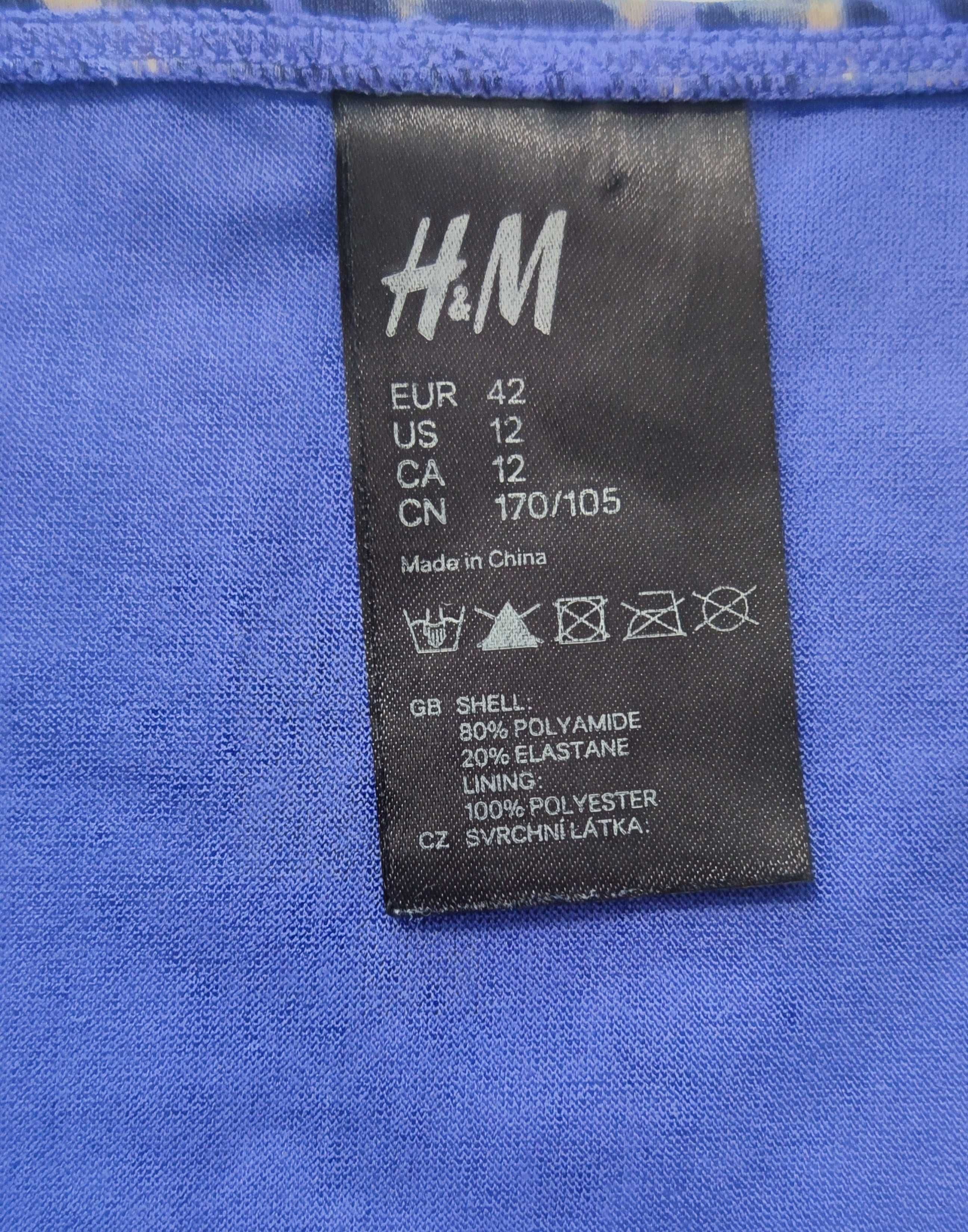 Piękny dół od bikini marki H&M r.42 w centki ze złotymi ozdobami