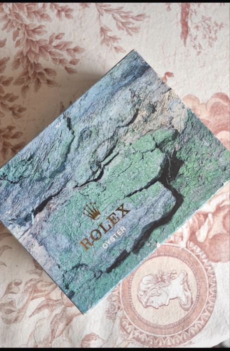 Rolex  dourado com caixa