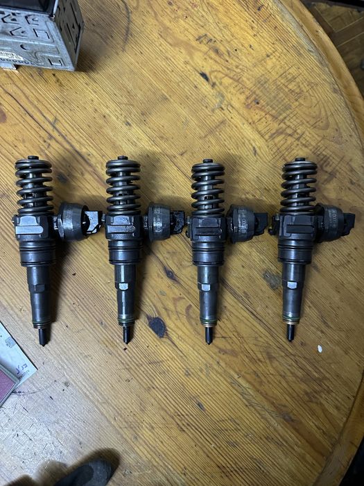 Насос форсунка фольцваген т5 caddy passat sharan golf 1.9