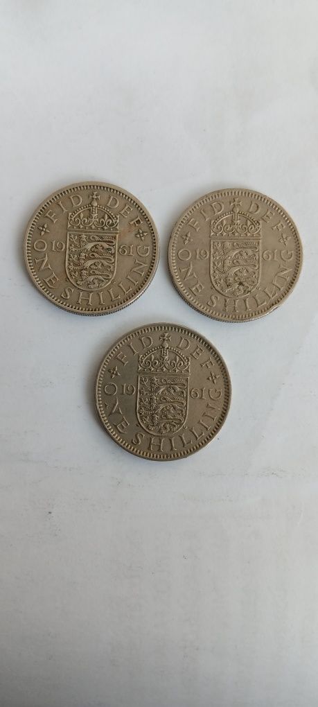 11 moedas de one shilling, escudo Inglês