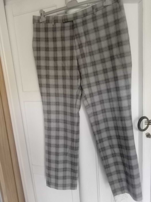 jak NOWE wełniane egipskie spodnie casual XL męskie klasyczne w kratę