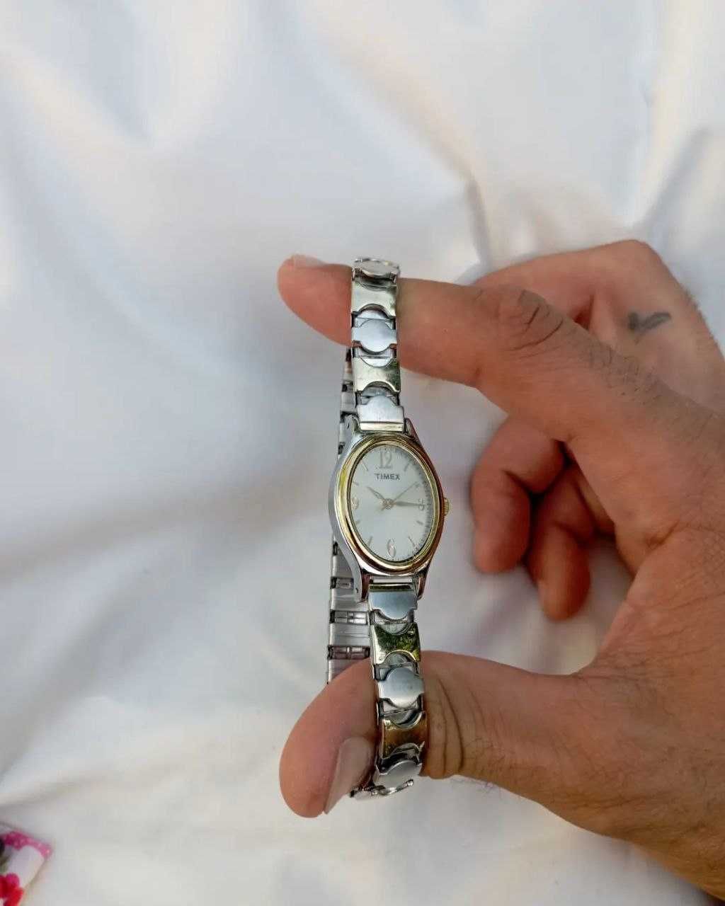 Часы Timex
Часы DKNY