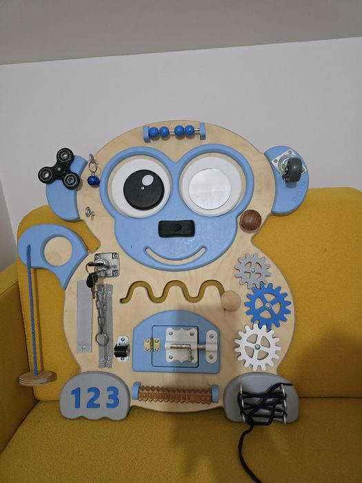 Tablica manipulacyjna sensoryczna Dodi Małpka Classic