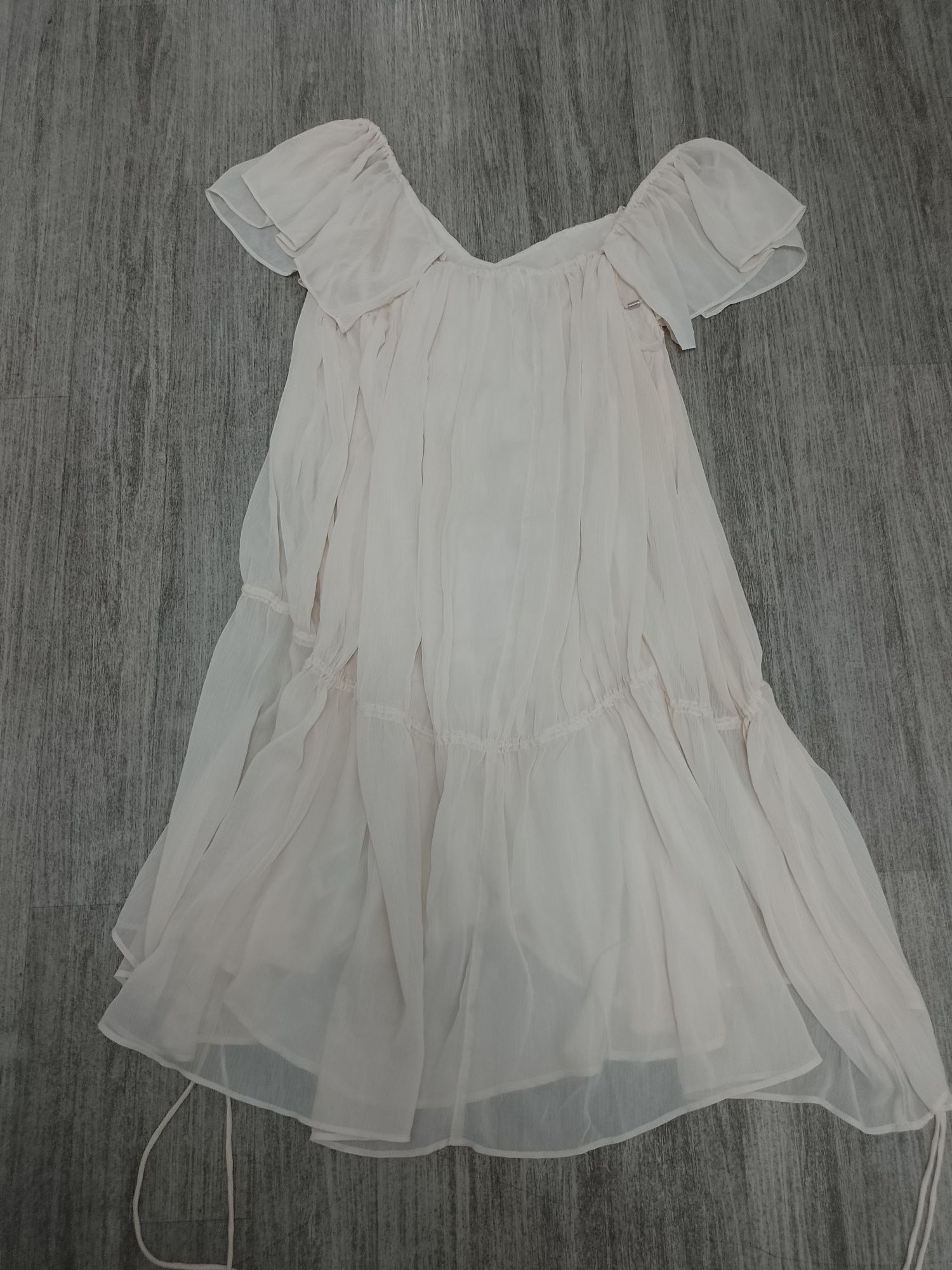 Sprzedam damską bluzkę rozmiar 34 firmy H&M.