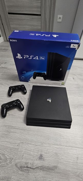 PlayStation 4 Pro 1 TB + 2 pady + 23 gry