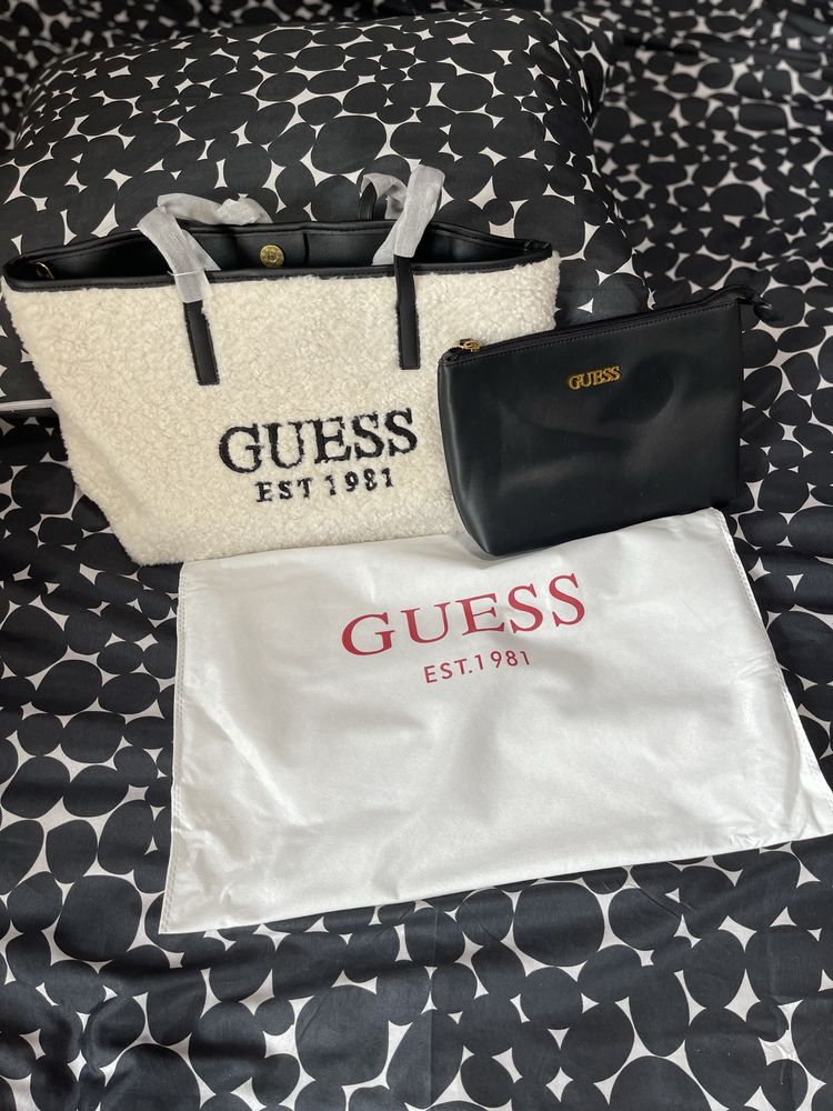 Mala da guess nova ainda com o saco