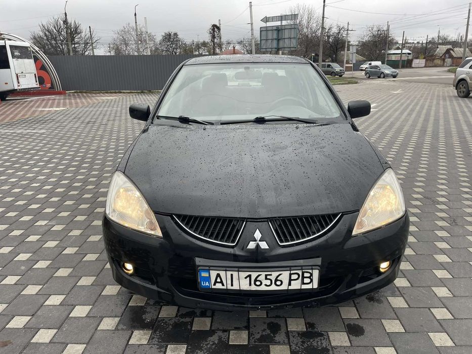 Mitsubishi Lancer 9 1.6 Газ Автомат
