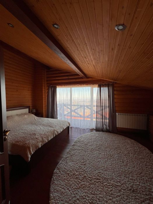 Продаж деревʼяного будинку