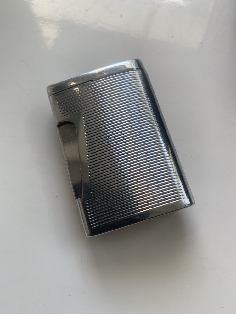Продам зажигалку